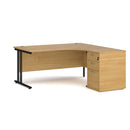 Dams Maestro 25 ergonomic desk with black oak finish and matching high pedestal, right-hand configuration, 1600mm length.