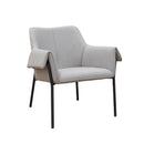 Dams Liana lounge chair with black metal frame, featuring a cozy fabric seat and modern design for living room decor.