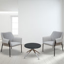 Dams Liana lounge chair with black metal frame and cushioned seat, modern design for living room or lounge area.