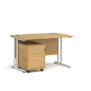 Dams Maestro 25 straight desk with white oak finish and 2-drawer under-desk pedestal in a modern office setup.