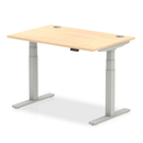 Dynamic Air 800mm deep height-adjustable maple desk with cable ports, featuring a sleek design and ergonomic workspace.