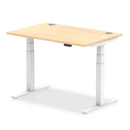 Dynamic Air 800mm deep height adjustable desk in maple with cable ports, featuring a modern workspace design.