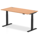Adjustable oak desk with black accents, 800mm deep with cable ports, from Dynamic, featuring height adjustment and modern design.