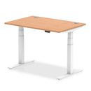 Dynamic Air 800mm deep height adjustable desk in oak with cable ports, showcasing a modern ergonomic workspace setup.