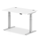 White Dynamic Air 800mm deep height adjustable desk with cable ports, featuring a modern design and clean surface.