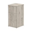 Gray oak Impulse filing cabinet by Dynamic with multiple drawers for organized storage, shown in a modern office setting.