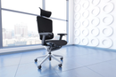 Black mesh Ergo Click Plus Posture Chair by Dynamic with adjustable armrests and ergonomic design for comfortable seating.